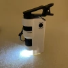 80-150x mobile phone holder, mini high-definition with LED light HT6701-B1 microscope magnifying glass Application Scenario